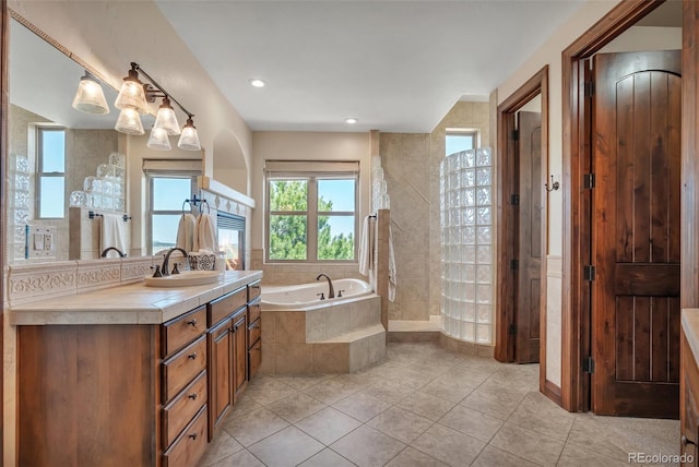 19336 Queens Crescent Way, Monument, CO 80132 - full bathroom featuring tile patterned flooring, a garden tub, vanity, recessed lighting, and a tile shower