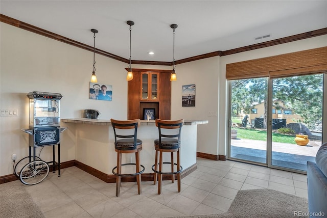19336 Queens Crescent Way, Monument, CO 80132 - bar featuring baseboards, ornamental molding, pendant lighting, light tile patterned floors, and recessed lighting