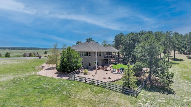 19336 Queens Crescent Way, Monument, CO 80132 - rear view of house with a patio