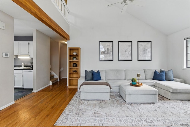 3105 Galileo Ln, Boulder, CO 80301 - living room with wood finished floors, ceiling fan, stairs, high vaulted ceiling, and baseboards