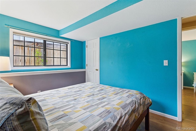 3105 Galileo Ln, Boulder, CO 80301 - bedroom featuring wood finished floors and baseboards