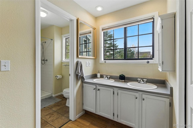 3105 Galileo Ln, Boulder, CO 80301 - full bath with toilet, tiled shower, and double vanity