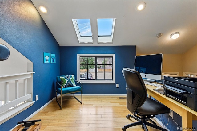 3105 Galileo Ln, Boulder, CO 80301 - office space with a skylight, lofted ceiling, wood finished floors, and baseboards