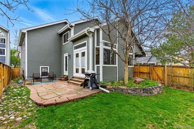 3105 Galileo Ln, Boulder, CO 80301 - rear view of house with entry steps, a patio, and french doors