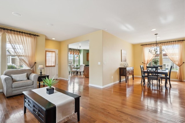 5603 Van Bibber Ct, Golden, CO 80403 - living room with a chandelier, light wood finished floors, and recessed lighting