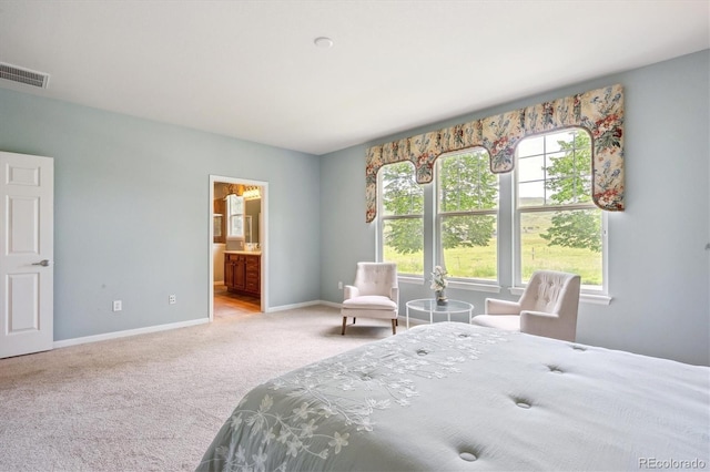 5603 Van Bibber Ct, Golden, CO 80403 - carpeted bedroom with baseboards and connected bathroom