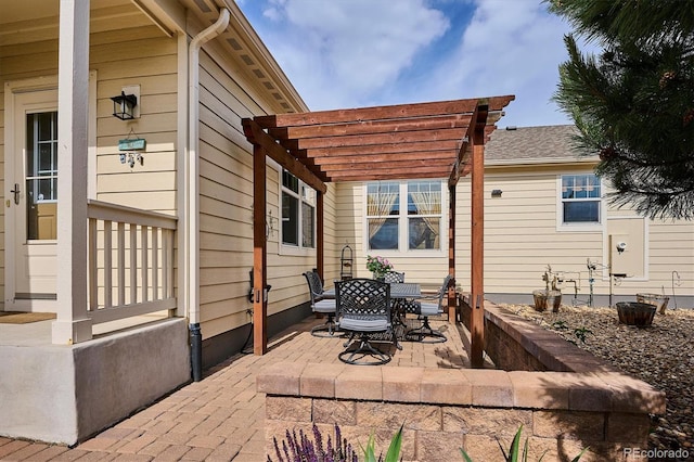 5603 Van Bibber Ct, Golden, CO 80403 - view of patio with a pergola and outdoor dining area