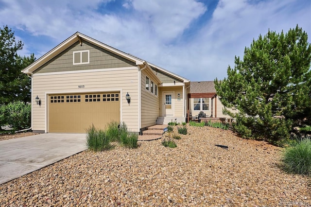 5603 Van Bibber Ct, Golden, CO 80403 - view of front of home featuring concrete driveway and an attached garage