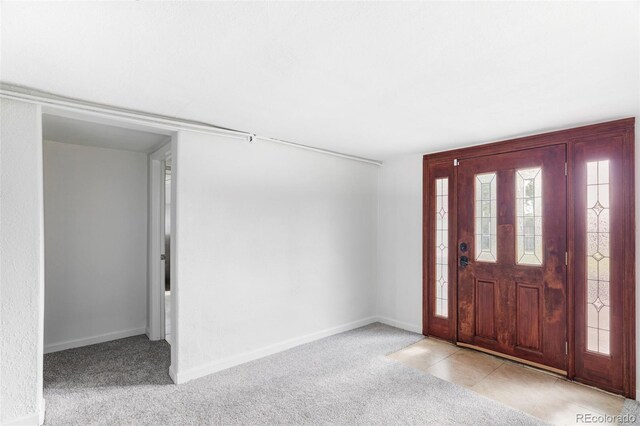 2895 S Sherman St, Englewood, CO 80113 - entryway with carpet flooring and baseboards
