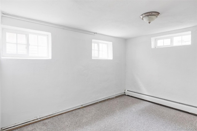 2895 S Sherman St, Englewood, CO 80113 - basement with a baseboard radiator and plenty of natural light
