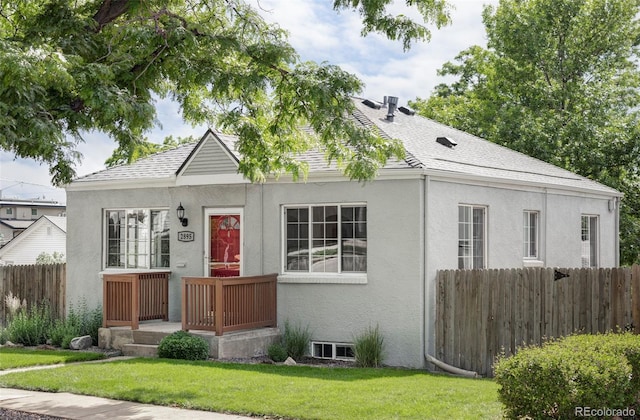 2895 S Sherman St, Englewood, CO 80113 - view of front facade featuring stucco siding and roof with shingles