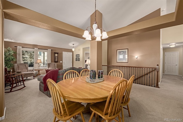 dining space featuring light carpet, lofted ceiling, and a notable chandelier