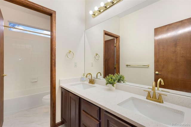 1831 Ashford Cir, Longmont, CO 80504 - full bathroom with double vanity, toilet, and tub / shower combination