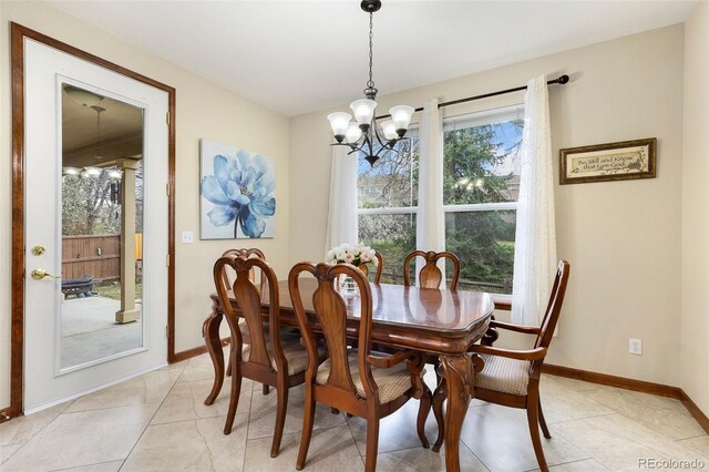 1831 Ashford Cir, Longmont, CO 80504 - dining space with a chandelier and baseboards