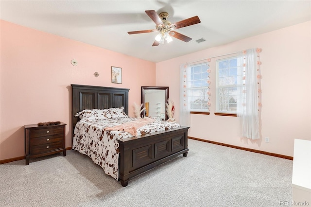 1831 Ashford Cir, Longmont, CO 80504 - bedroom with light colored carpet, baseboards, and ceiling fan