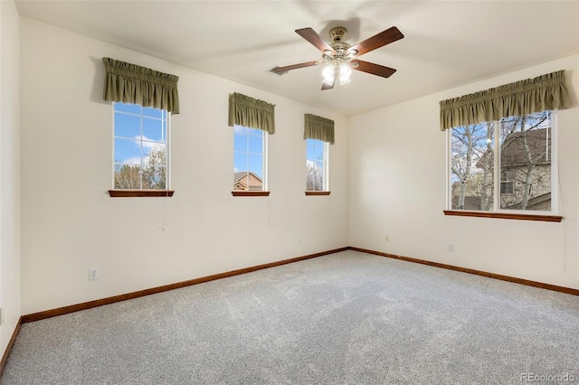 1831 Ashford Cir, Longmont, CO 80504 - carpeted empty room featuring baseboards and a ceiling fan