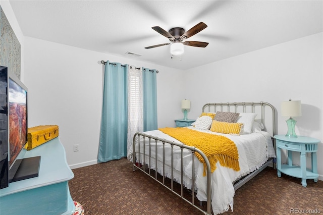1831 Ashford Cir, Longmont, CO 80504 - carpeted bedroom with baseboards and a ceiling fan