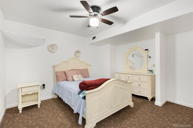 1831 Ashford Cir, Longmont, CO 80504 - bedroom featuring dark carpet, baseboards, and ceiling fan