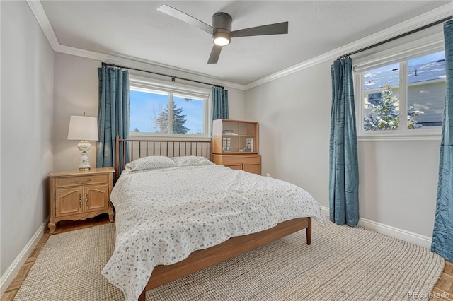 bedroom featuring ceiling fan and ornamental molding