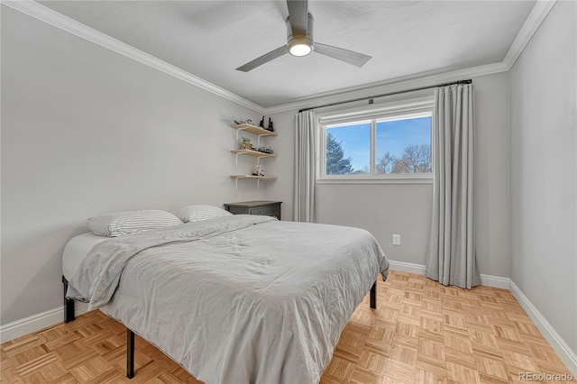 bedroom with ceiling fan, crown molding, and light parquet floors