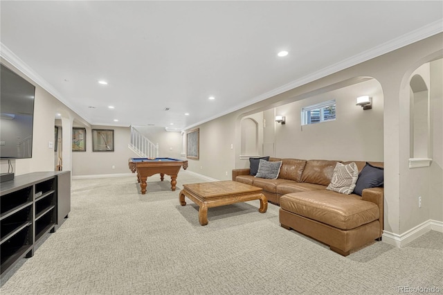 rec room with light colored carpet and ornamental molding