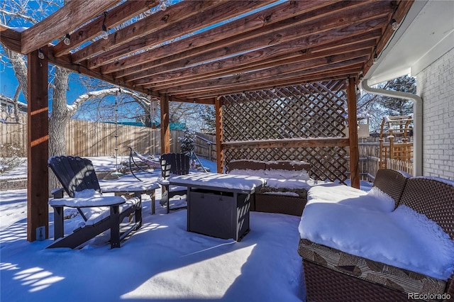 view of snow covered patio