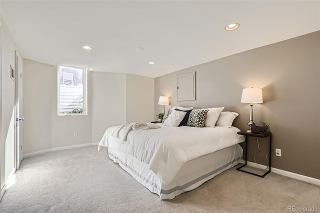 bedroom featuring light colored carpet