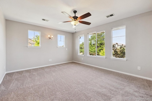 10480 Truckee St Unit B, Commerce City, CO 80022 - spare room with carpet floors and a ceiling fan