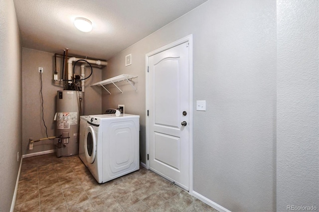 10480 Truckee St Unit B, Commerce City, CO 80022 - laundry area featuring washer / clothes dryer and water heater