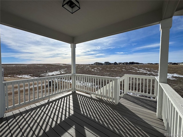 view of snow covered deck