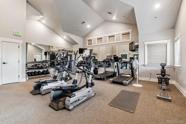 gym with high vaulted ceiling, baseboards, carpet flooring, and visible vents