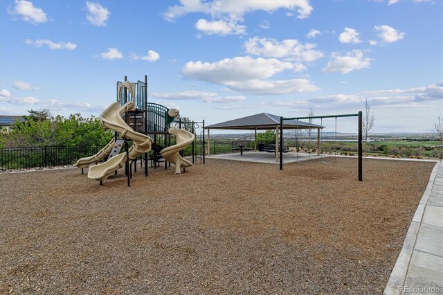 communal playground with fence and a gazebo