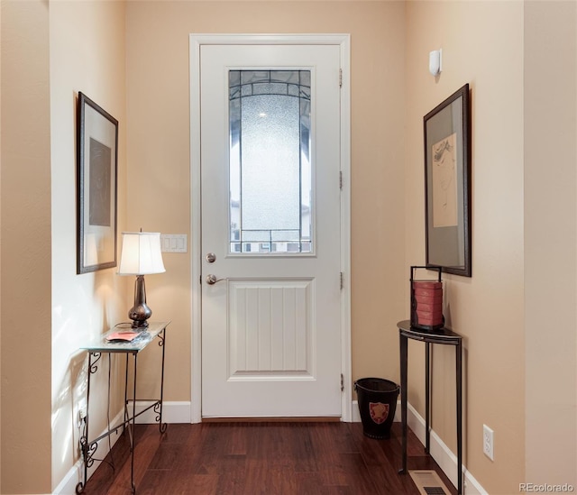 16 Willowcroft Dr, Littleton, CO 80123 - foyer entrance featuring dark wood finished floors