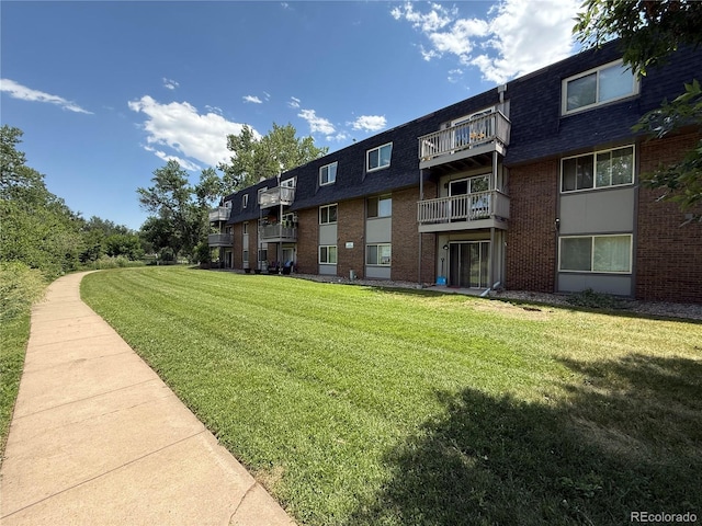 309 E Highline Cir Unit 102, Centennial, CO 80122 - surrounding community featuring a lawn