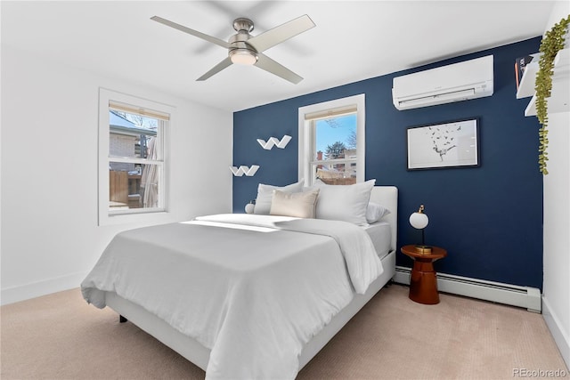 carpeted bedroom with ceiling fan, a wall unit AC, and a baseboard radiator