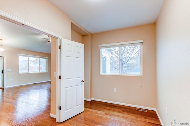 107 Carina Cir, Loveland, CO 80537 - spare room with light wood-style floors and baseboards