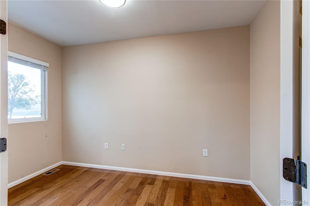107 Carina Cir, Loveland, CO 80537 - unfurnished room featuring wood finished floors and baseboards