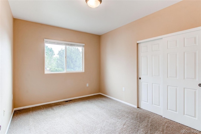 107 Carina Cir, Loveland, CO 80537 - unfurnished bedroom with carpet, a closet, and baseboards