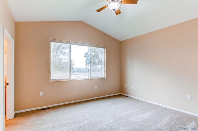 107 Carina Cir, Loveland, CO 80537 - unfurnished room with a ceiling fan, vaulted ceiling, light carpet, and baseboards