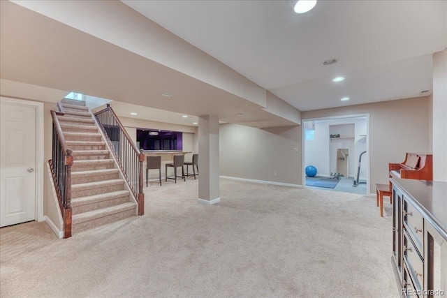 8167 S Wabash Ct, Centennial, CO 80112 - finished basement featuring light colored carpet, stairs, and recessed lighting