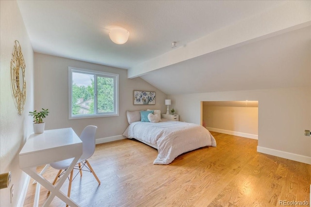 8167 S Wabash Ct, Centennial, CO 80112 - bedroom featuring lofted ceiling and light wood-style floors