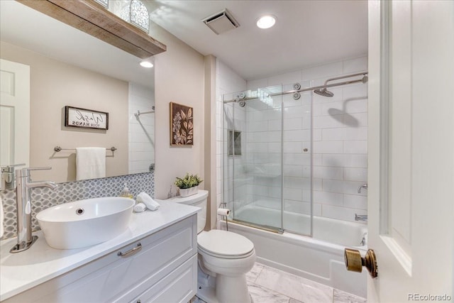 8167 S Wabash Ct, Centennial, CO 80112 - full bath featuring vanity, enclosed tub / shower combo, decorative backsplash, marble finish floors, and recessed lighting