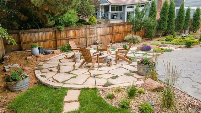 8167 S Wabash Ct, Centennial, CO 80112 - view of patio / terrace with an outdoor fire pit