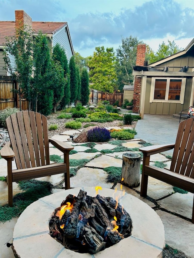 8167 S Wabash Ct, Centennial, CO 80112 - view of patio featuring an outdoor fire pit