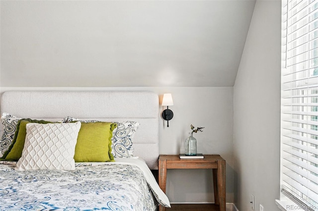 bedroom featuring vaulted ceiling