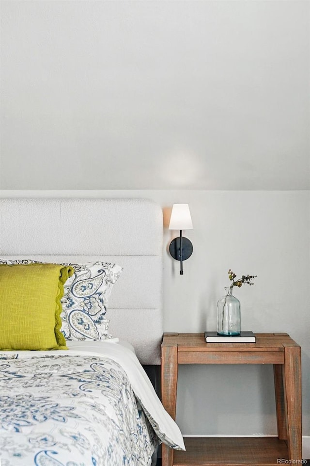 bedroom featuring wood finished floors