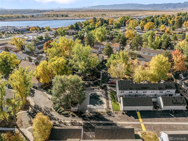 bird's eye view featuring a water and mountain view