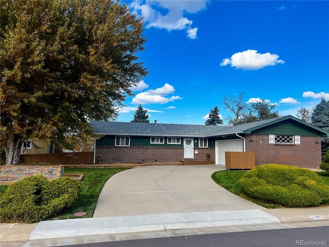 single story home featuring a garage