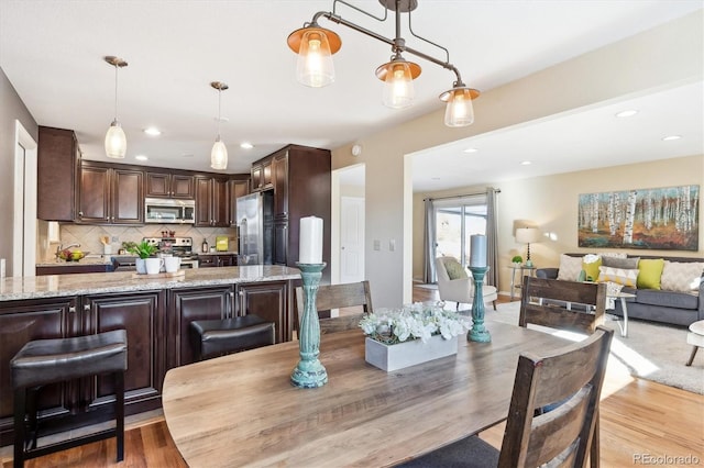 dining area featuring light hardwood / wood-style flooring