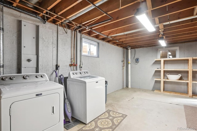 laundry room with washing machine and dryer